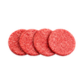 four raw hamburger patties on a white background
